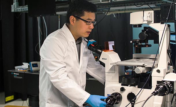 Xingjie Ni at work in his lab.