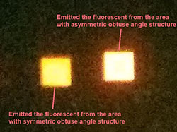 Comparing the light that was emitted from symmetric and asymmetric structures
